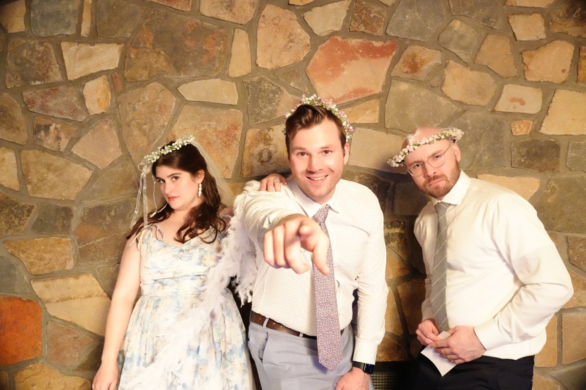 Three guests captured straight off the camera, before the print template is applied.