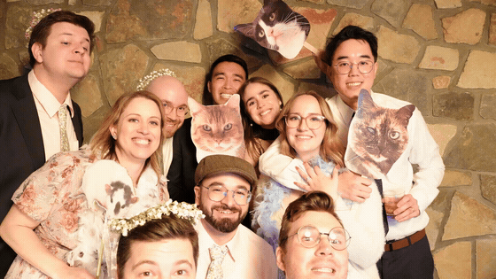 An animated GIF capture of guests at the booth.